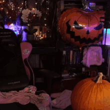 a pink chair with a hello kitty sticker on the back