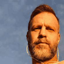 ron beard sky selfie stare