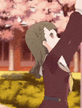 a girl in a school uniform is standing in front of a cherry blossom tree with her arms outstretched