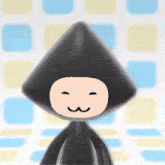 a cartoon character with a triangle hat and a smile