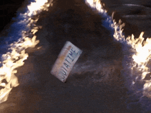 a license plate that says ' guiatie ' on it is on fire