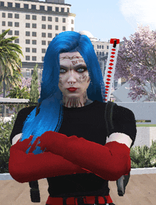 a woman with blue hair and red gloves has a tattoo on her face that says dfm
