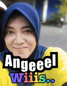 a woman wearing a blue head scarf and a yellow shirt with the name angeeel willis written on it