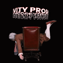 a person is laying on their back in a chair with the word gravity pro behind them