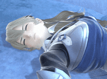 a video game character is laying on a blue surface with her eyes closed