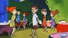 a group of cartoon characters are standing around a table