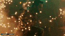 a man is surrounded by sparks and smoke with the hashtag pranay_varma on the bottom