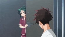 a boy and a girl are standing next to each other in a dark room