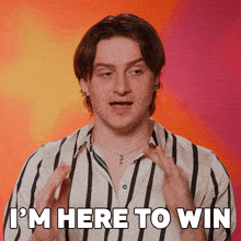 a man says i 'm here to win with his hands up