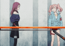 two anime girls are standing next to each other with one wearing a jacket with the letter b on it