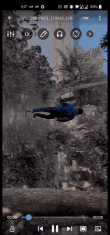 a phone screen shows a video of a man flying through the air with the time of 11:17
