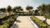 a computer generated image of a garden with palm trees