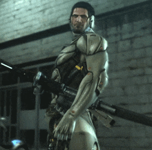 a man in a futuristic suit is holding a gun with a sticker on it that says ' a '