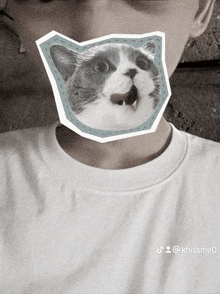 a person with a picture of a cat on their neck