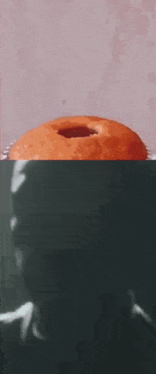 a close up of a donut with a hole in the middle .