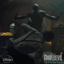 a poster for daredevil born again shows a man in a suit