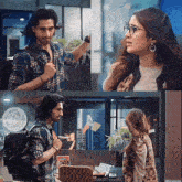 a man and a woman are standing next to each other in a room