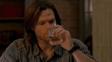 Sam Winchester GIF - Sam Winchester Drink GIFs