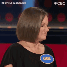 a woman with the name karen on her shirt