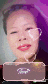 a woman with the name tere written on her face