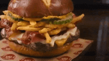 Wendys Pretzel Pub Bacon Cheeseburger GIF - Wendys Pretzel Pub Bacon Cheeseburger Fast Food GIFs
