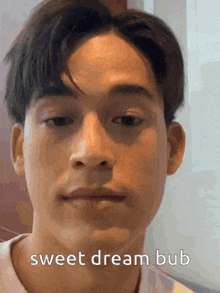 a close up of a man 's face with the words sweet dream bub written on the bottom .