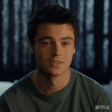 a close up of a man 's face with a netflix logo visible