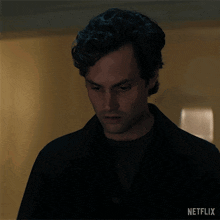 a close up of a man 's face with a netflix logo below him