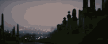 a blurred image of a cemetery at night with a city in the background