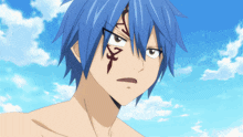 a boy with blue hair has a tattoo on his face