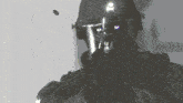 a man in a helmet is holding a gun with purple eyes