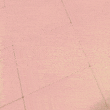 a cartoon girl is standing next to a man laying on the ground .