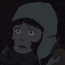 a close up of a person 's face with a hood