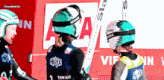 a person wearing a helmet that says uvex on it