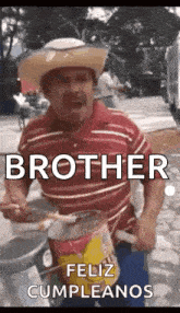 a man in a cowboy hat is playing a drum and says `` brother feliz cumpleanos '' .