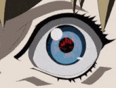 a close up of a person 's eye with a red circle in the center