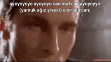 a close up of a man 's face with the words ayoyoyo ayoyoyo can mal can ayoyoyo written above him