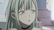a girl with a choker around her neck is looking at something
