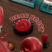 a red button with the word boost written around it