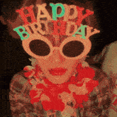 a person wearing sunglasses that say happy birthday on them