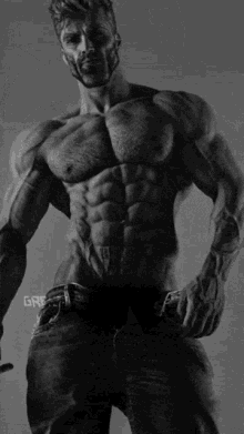 a black and white photo of a muscular man with the word gre on the bottom