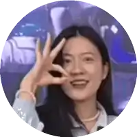 a woman is making an ok sign with her hand
