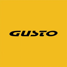 a yellow background with the word gusto in black letters .