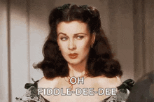 a close up of a woman 's face with the words `` oh fiddle - dee - dee '' written on it .