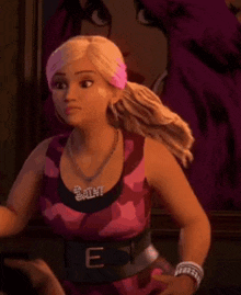 a barbie doll is wearing a pink tank top and a necklace with the letter e on it .