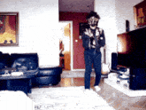 a man wearing a mask is standing in a living room holding a guitar