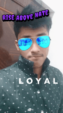 a man wearing sunglasses has the words rise above hate above his face