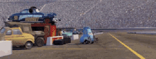 Cars Pit Stop GIF