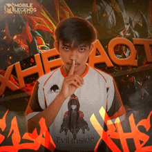 a poster for mobile legends shows a man with his finger to his lips