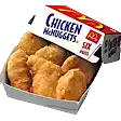a box of chicken nuggets is sitting on a white surface .